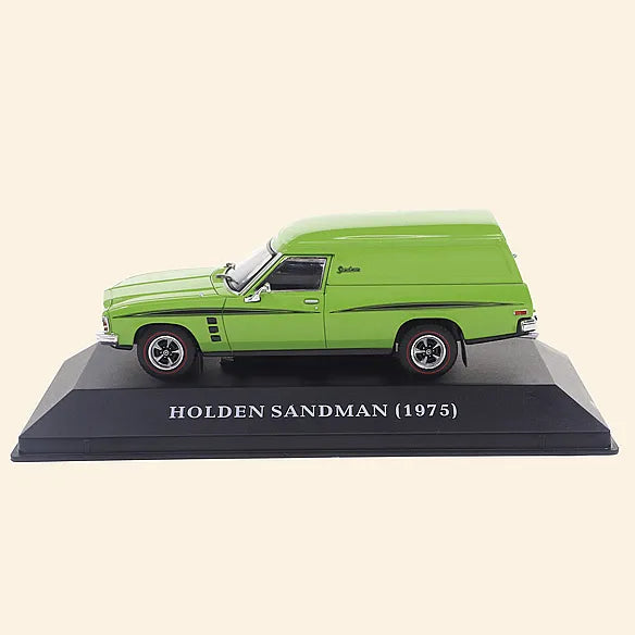 a model of a green truck on a black base