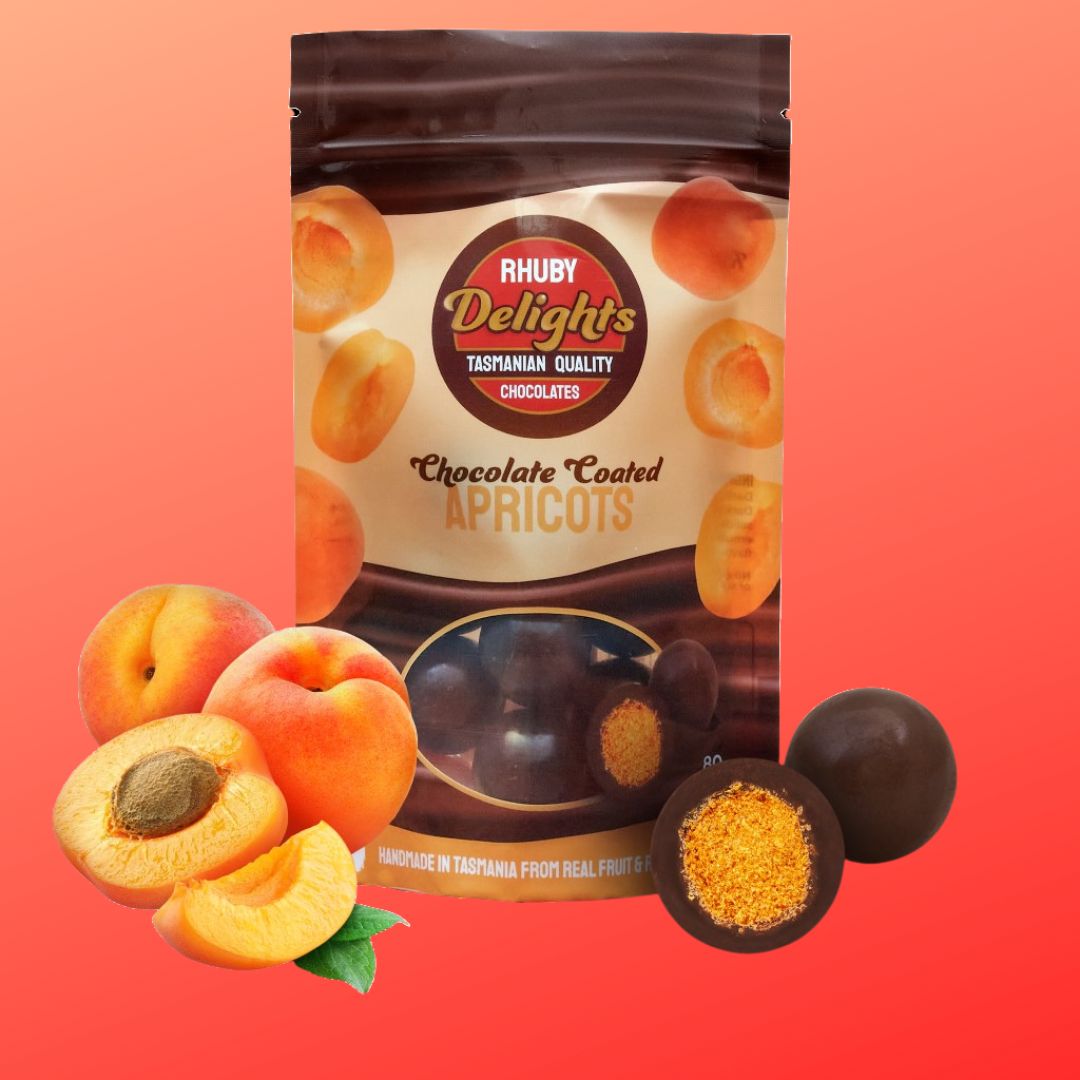 a bag of chocolate covered apricots next to a bag of dried aprico